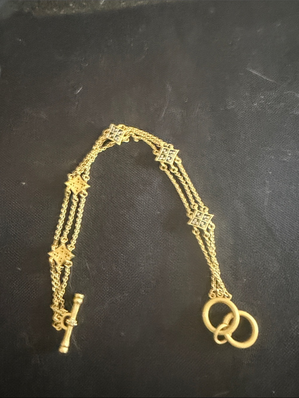 Elegant Gold Multi-Chain Toggle Bracelet with Decorative Links